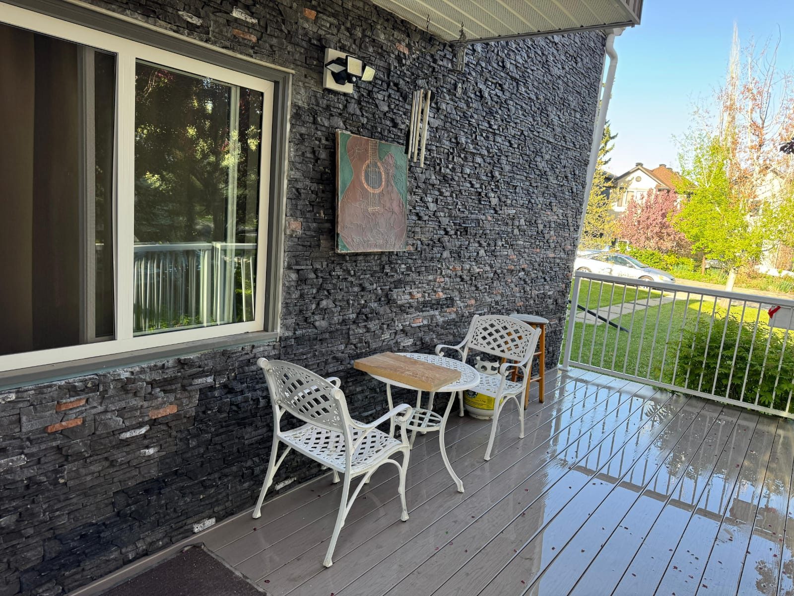Stone veneer exterior with patio, Calgary home